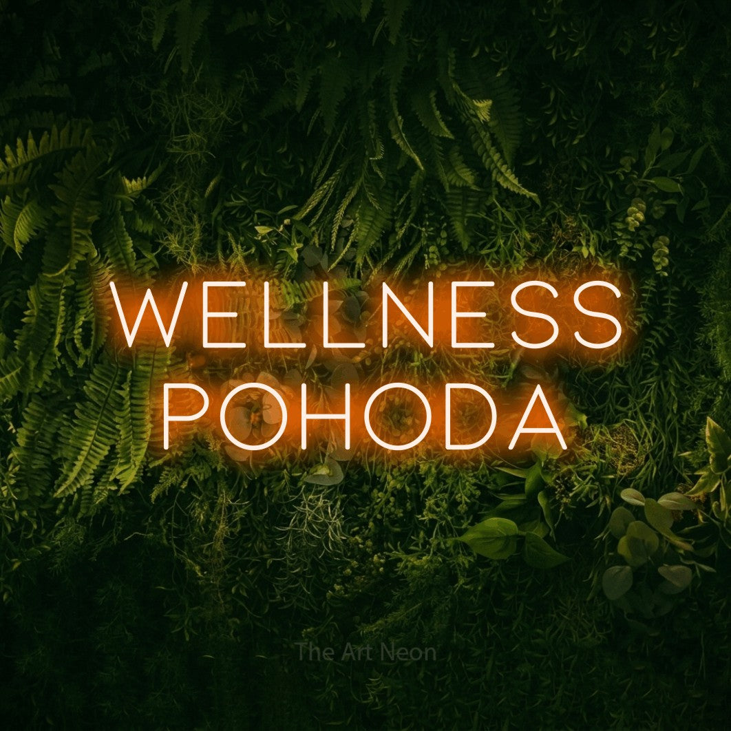 LED neon sign reading “Wellness Pohoda”, arranged in two lines.