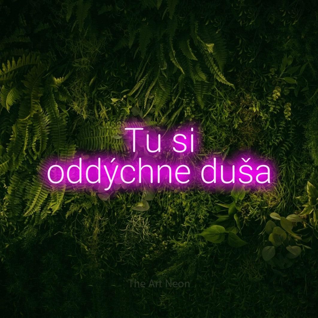 LED neon sign reading “Tu si oddýchne duša”, arranged in two lines.
