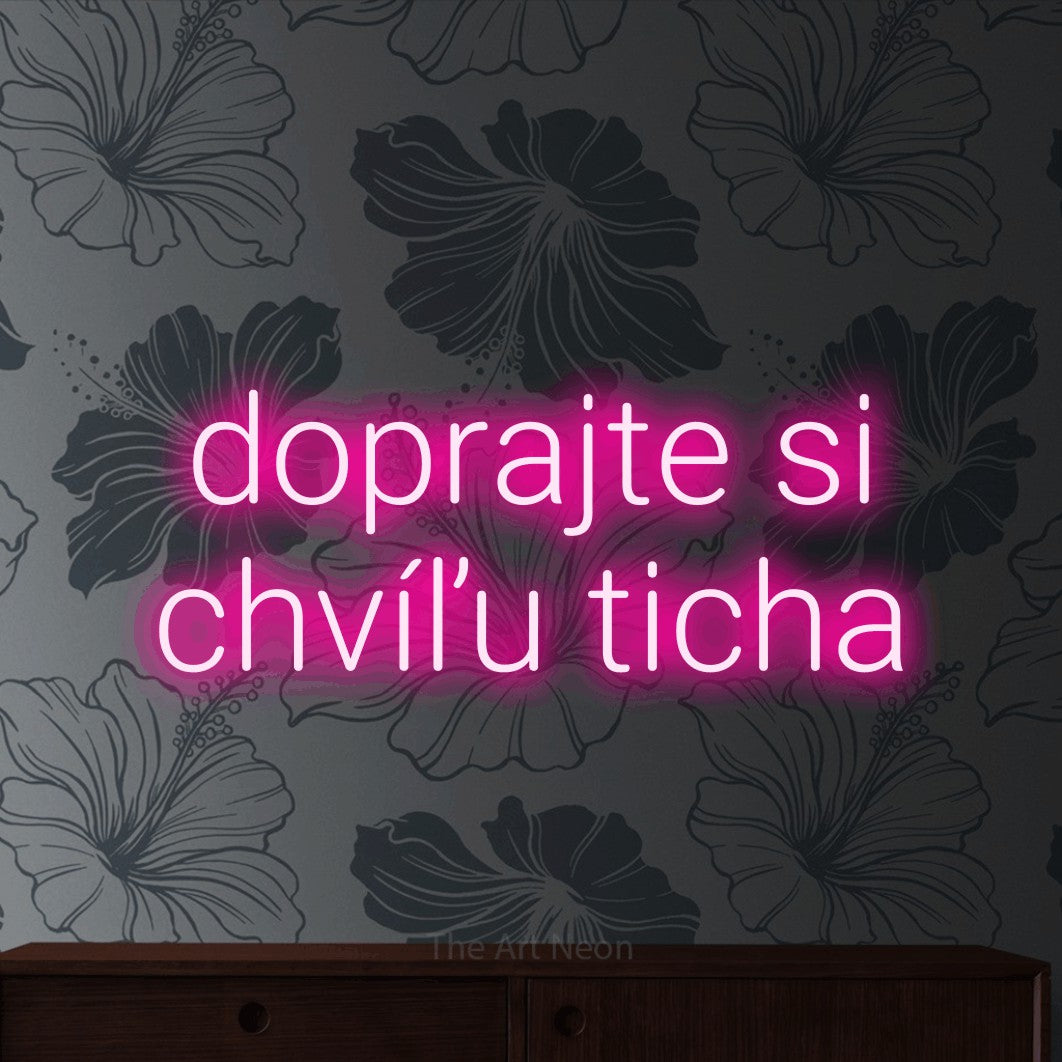LED neon sign reading “doprajte si chvíľu ticha”, arranged in two lines.