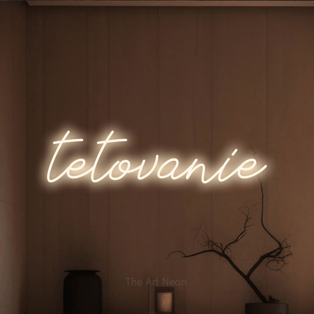 LED neon sign reading “tetovanie”, arranged in a single line.