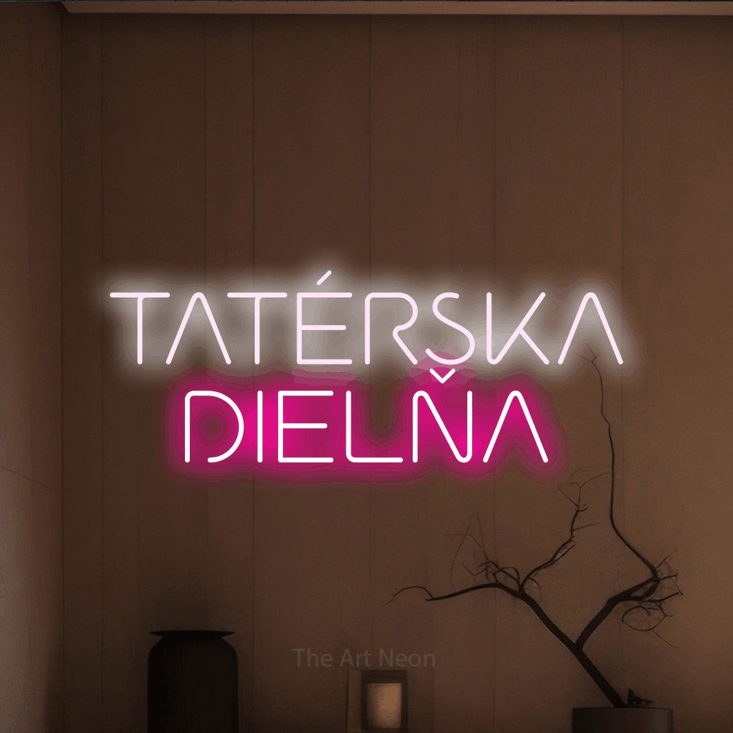 LED neon sign reading “TATÉRSKA DIELŇA”, arranged in two lines.