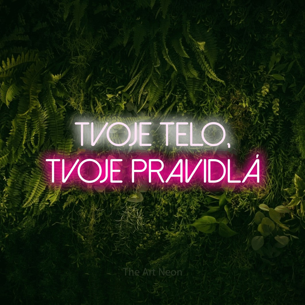 LED neon sign reading “tvoje telo, tvoje pravidlá”, arranged in two lines.