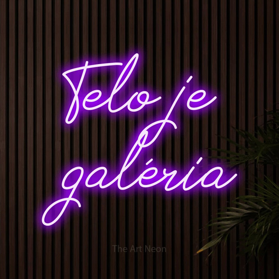 LED neon sign reading “Telo je galéria”, arranged in two lines.