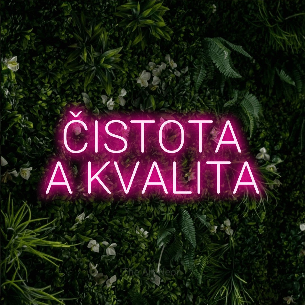 LED neon sign reading “ČISTOTA A KVALITA”, arranged in two lines.