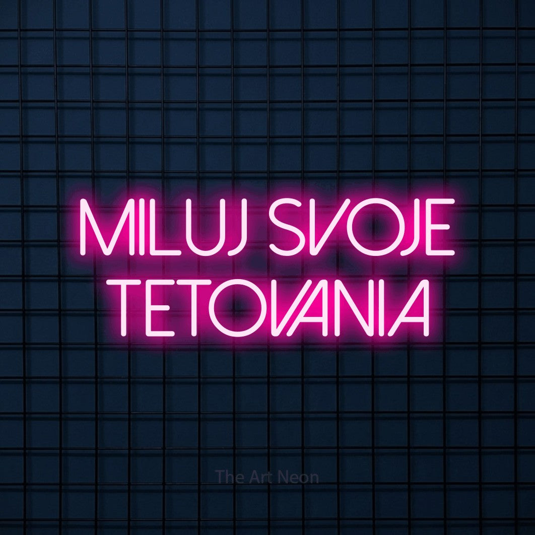 LED neon sign reading “Miluj Svoje Tetovania”, arranged in two lines.