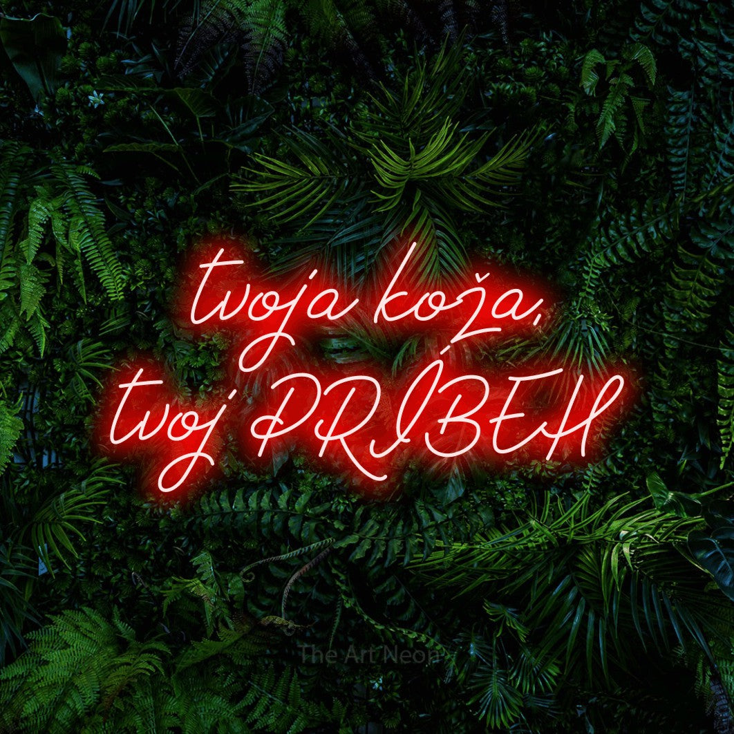 LED neon sign reading “tvoja koža, tvoj PRÍBEH”, arranged in two lines.