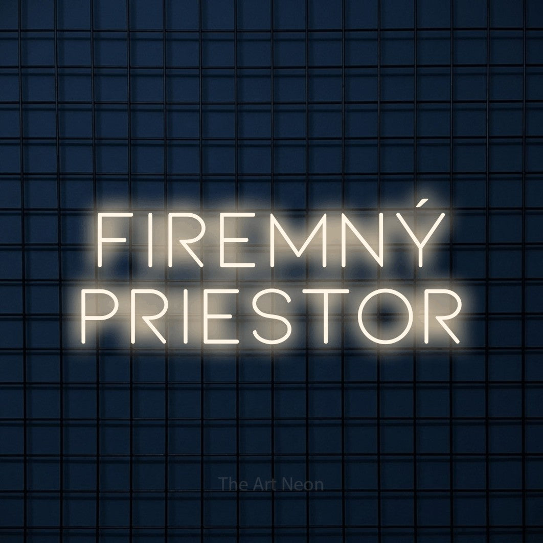 LED neon sign reading “firemný priestor”, arranged in two lines.