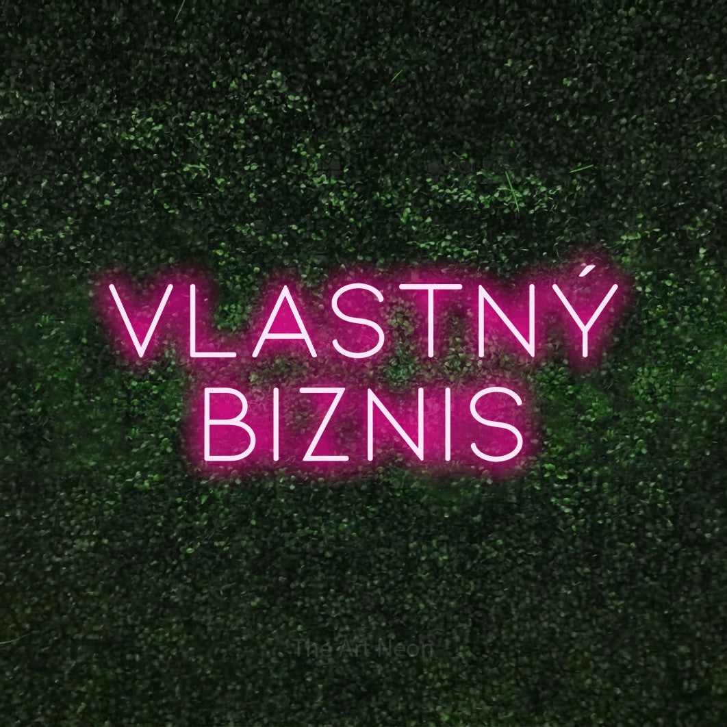 LED neon sign reading “Vlastný Biznis”, arranged in two lines.