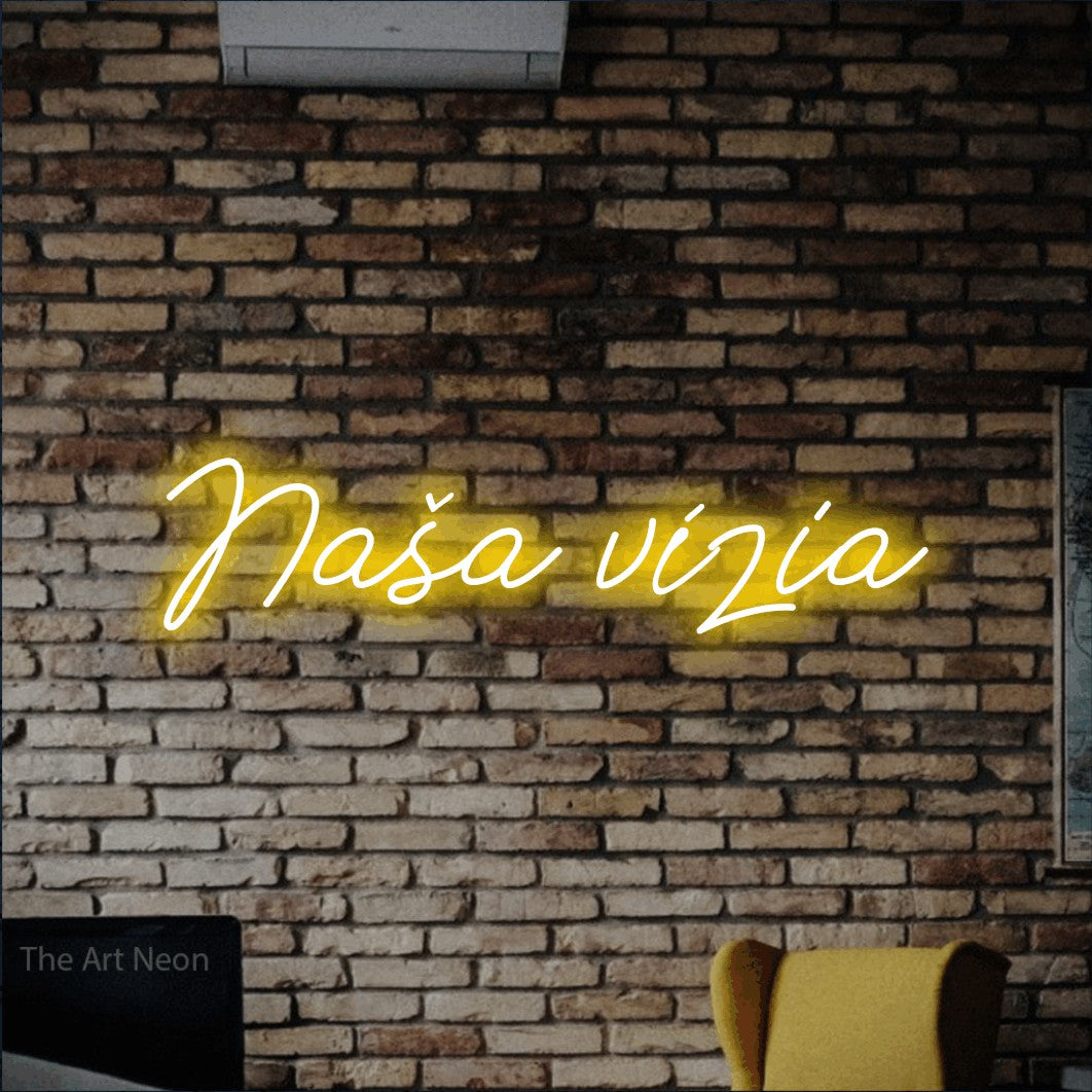 LED neon sign reading “Naša vízia”, arranged in a single line.