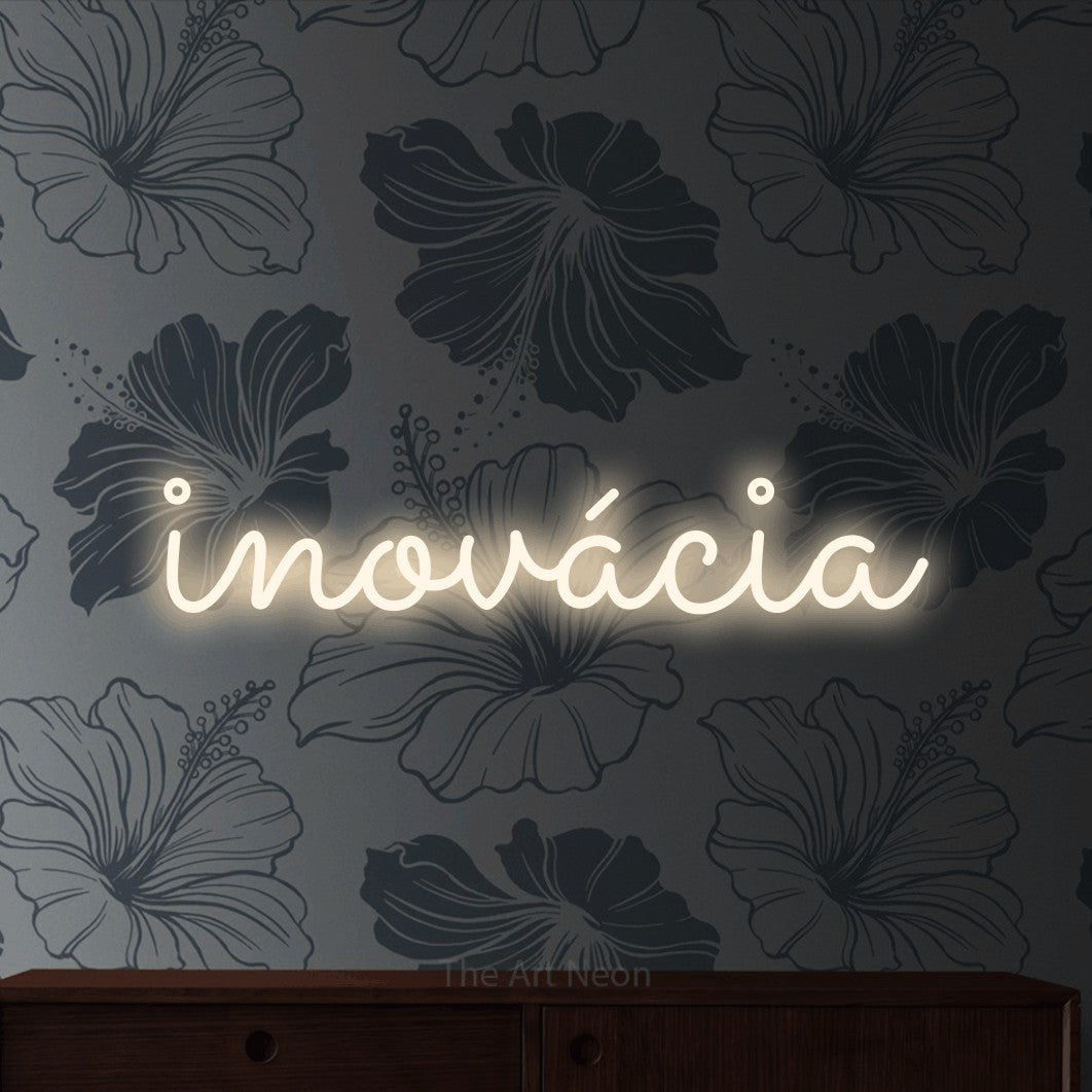 LED neon sign reading “inovácia”, arranged in a single line.