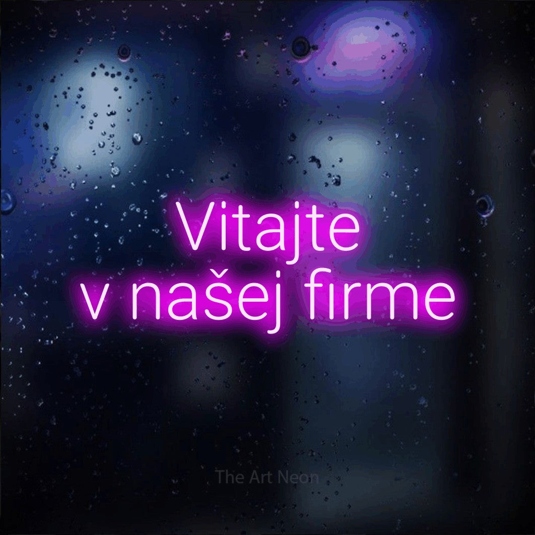 LED neon sign reading “Vitajte v našej firme”, arranged in two lines.