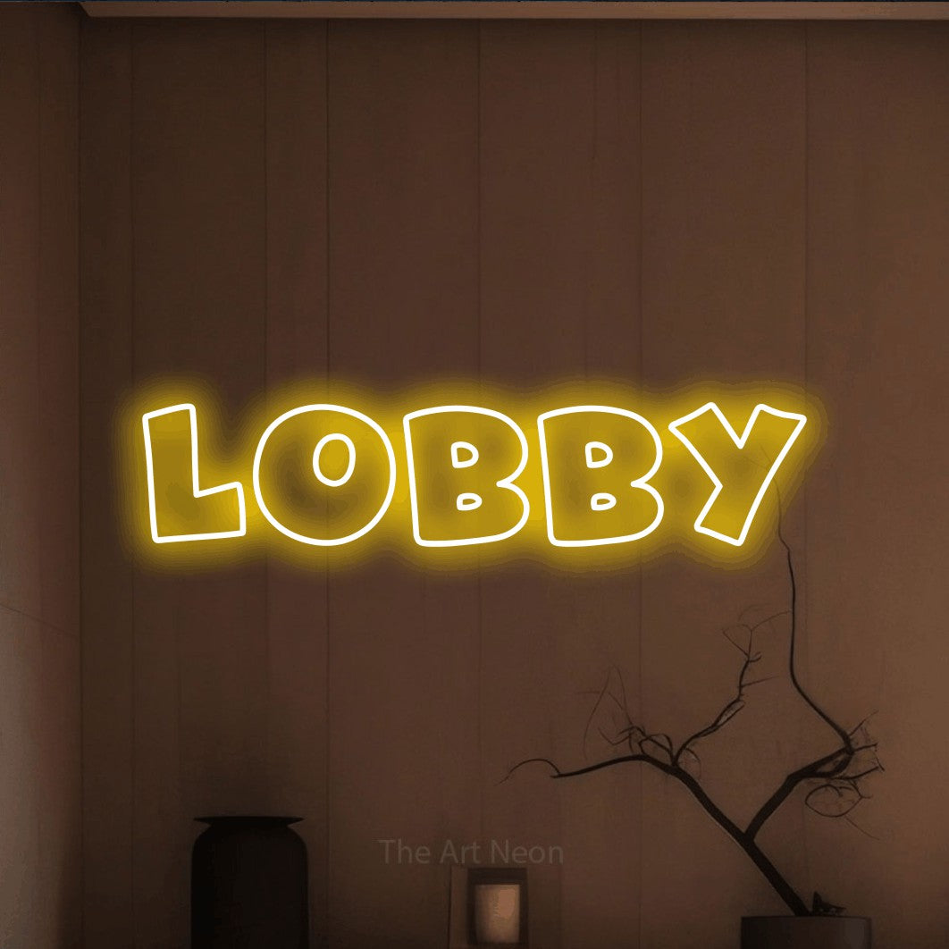 LED neon sign reading “lobby”, arranged in a single line.