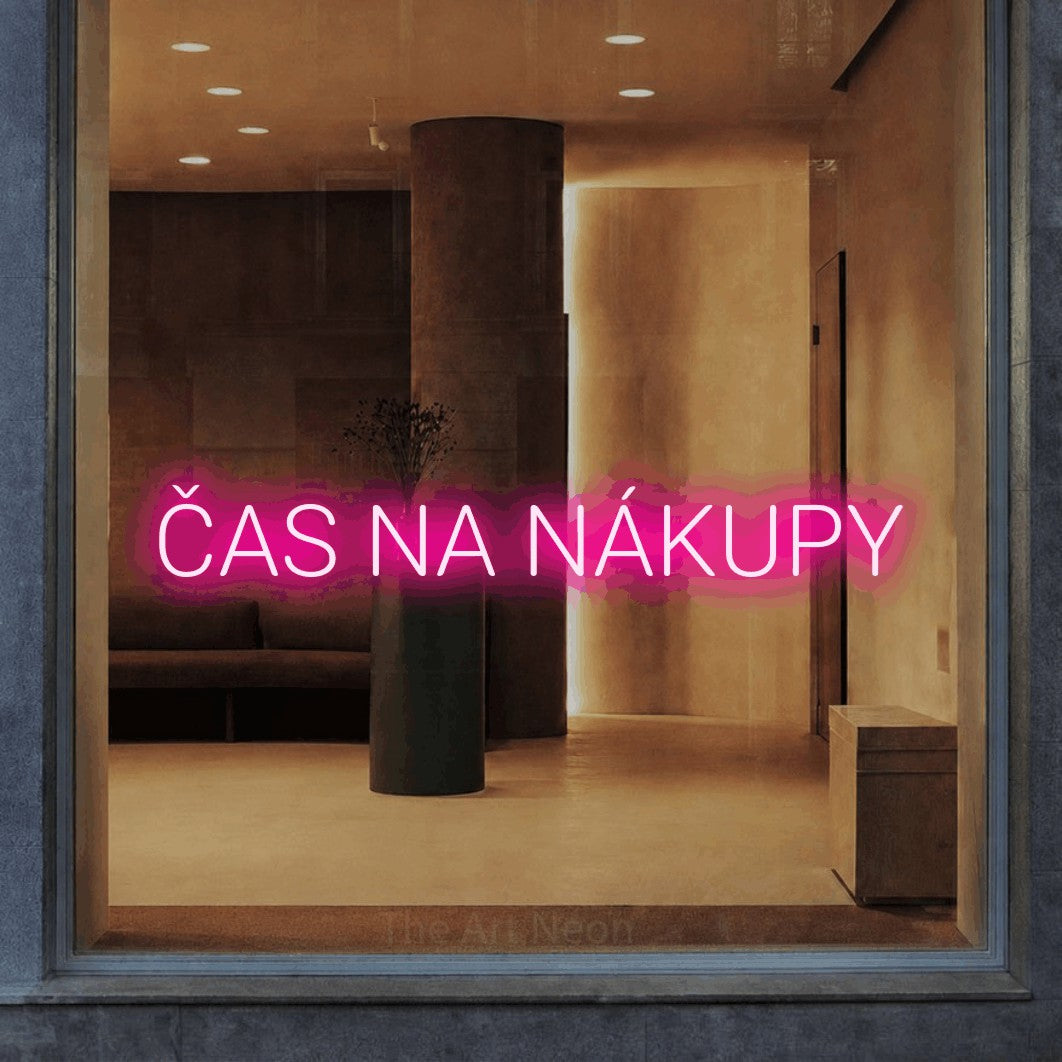LED neon sign reading “ČAS NA NÁKUPY”, arranged in a single line.