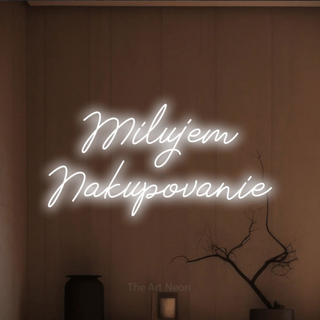 LED neon sign reading “Milujem Nakupovanie”, arranged in two lines.
