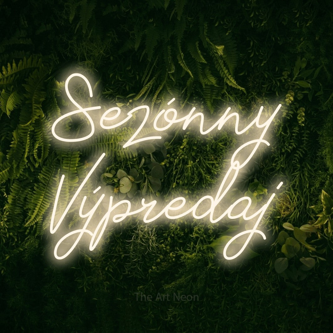 LED neon sign reading “Sezónny Výpredaj”, arranged in two lines.