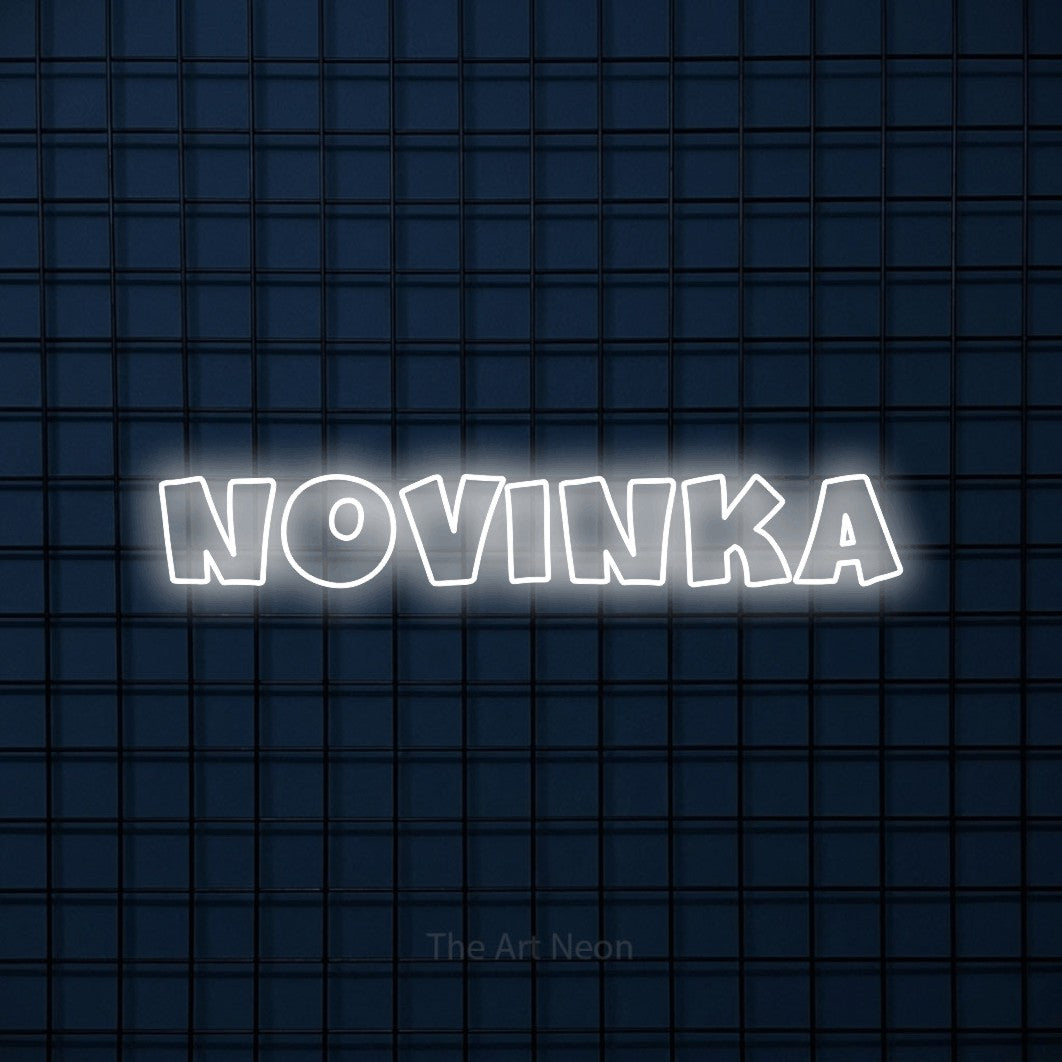 LED neon sign reading “novinka”, arranged in a single line.