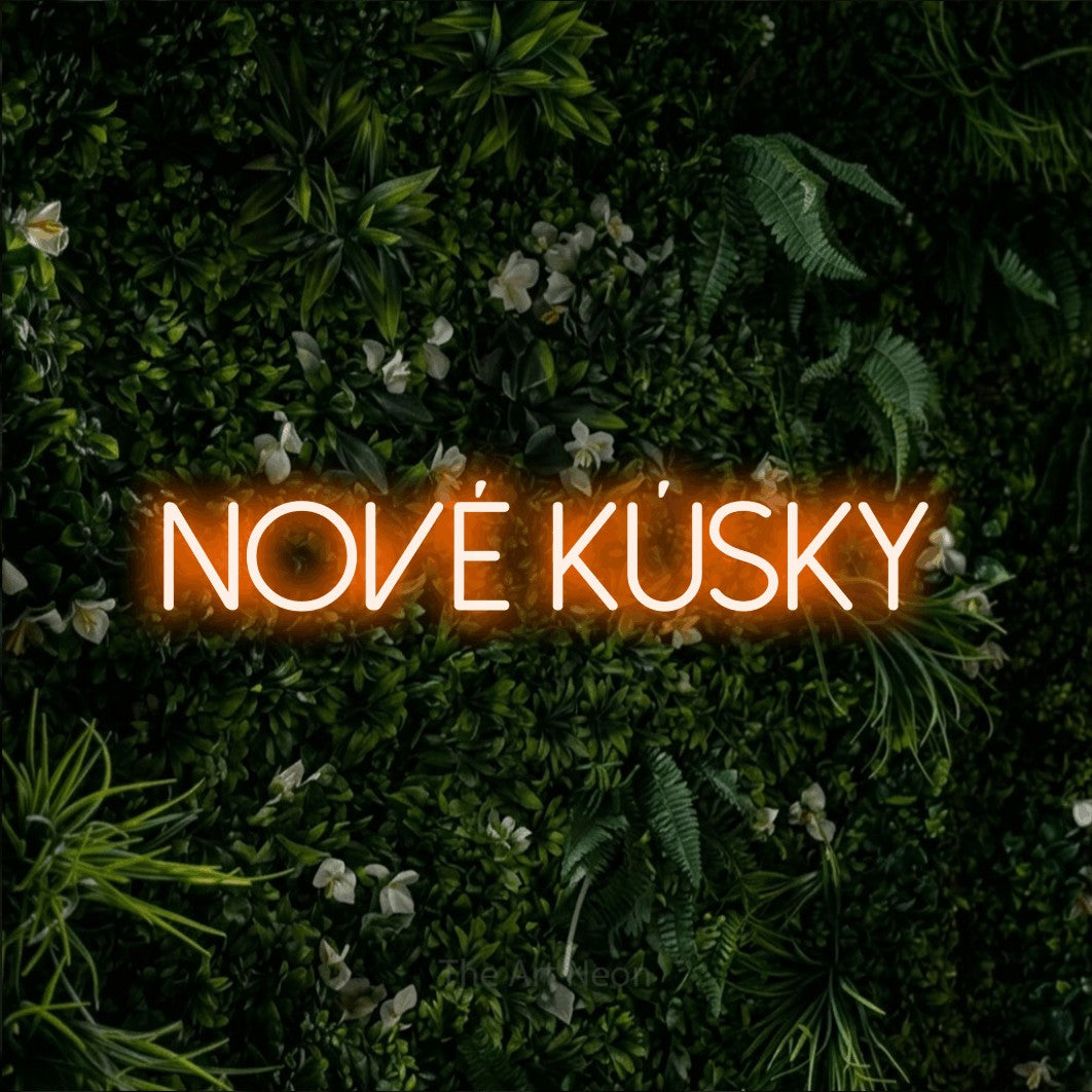 LED neon sign reading “Nové Kúsky”, arranged in a single line.