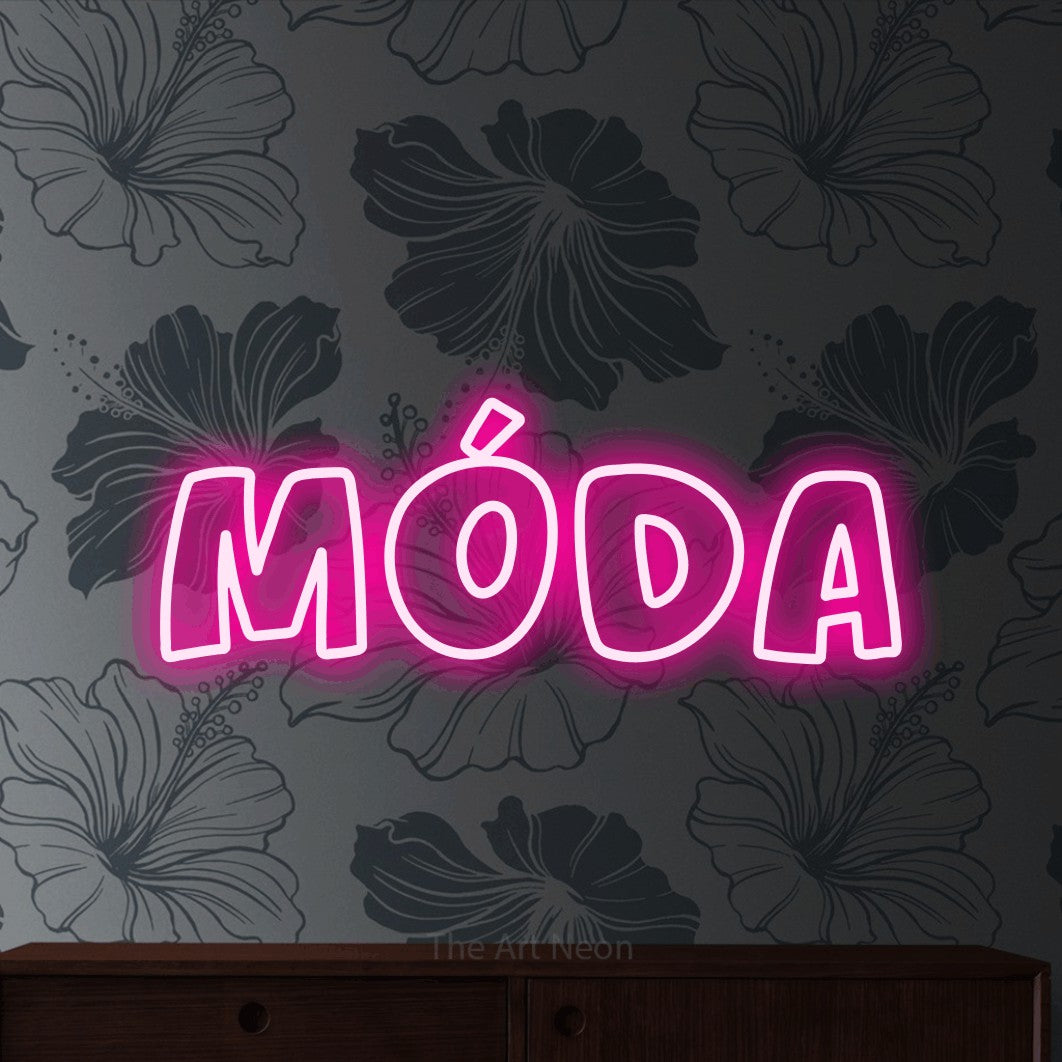 LED neon sign reading “Móda”, arranged in a single line.
