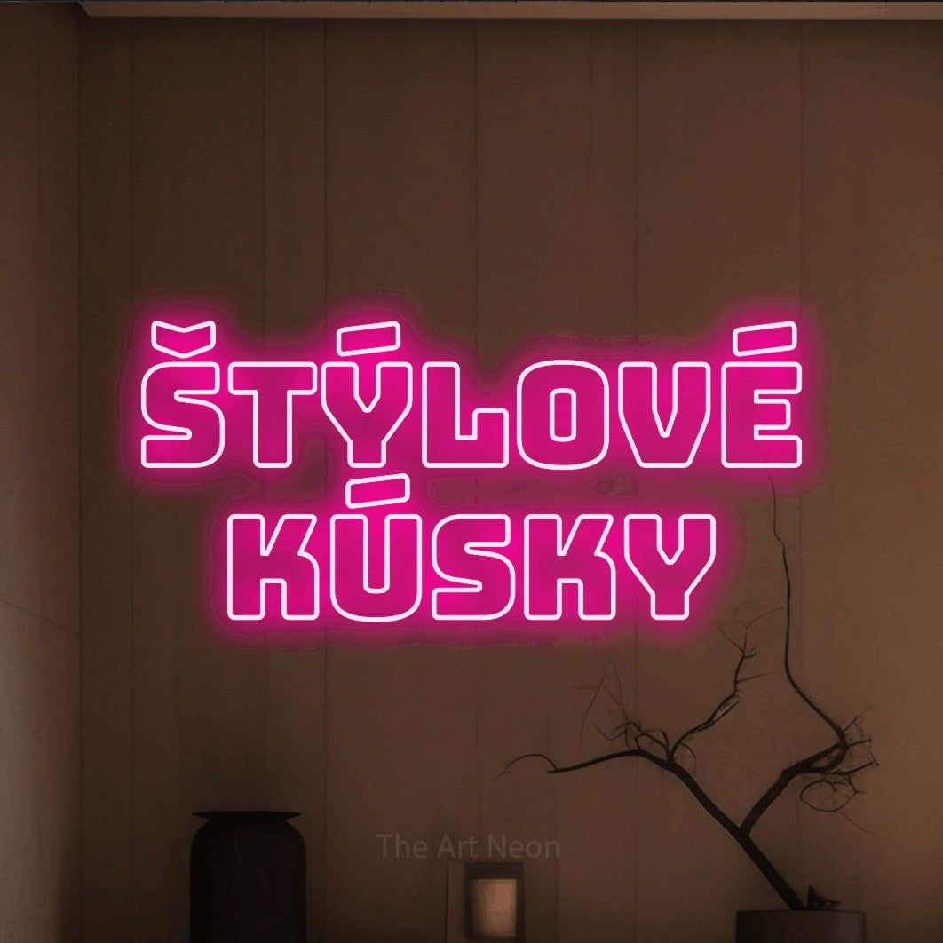 LED neon sign reading “ŠTÝLOVÉ KÚSKY”, arranged in two lines.