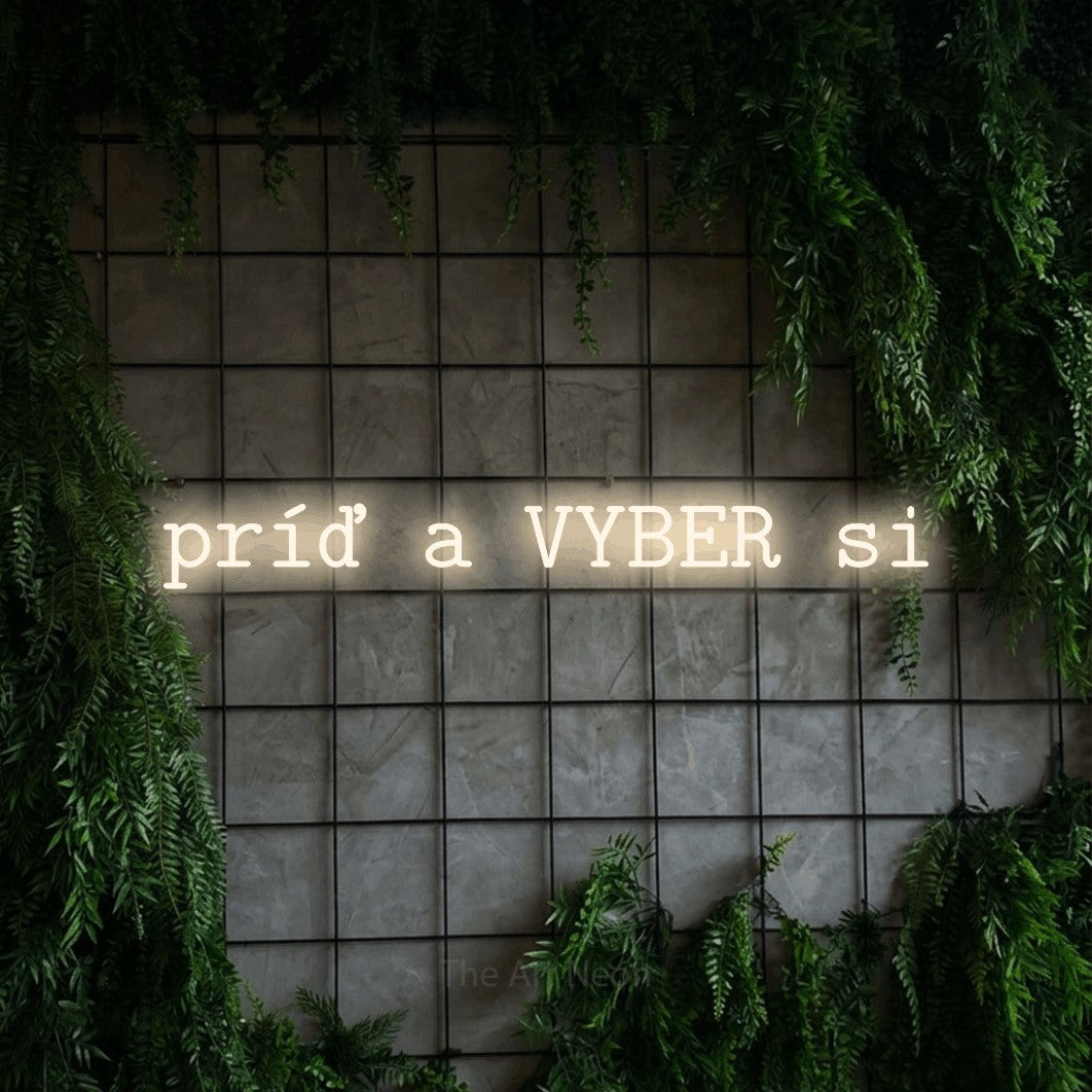 LED neon sign reading “príď a VYBER si”, arranged in a single line.