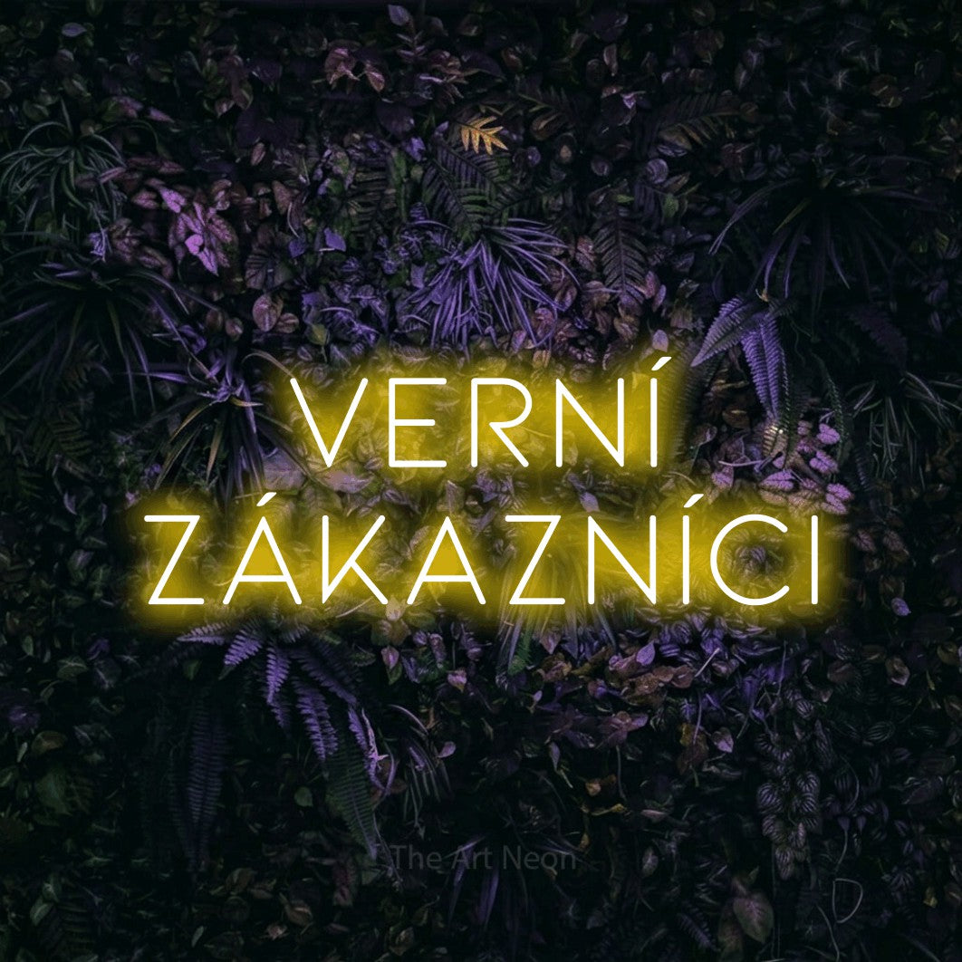 LED neon sign reading “verní ZÁKAZNÍCI”, arranged in two lines.