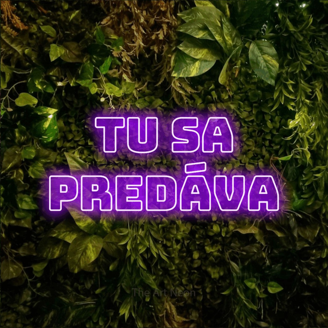 LED neon sign reading “tu sa PREDÁVA”, arranged in two lines.