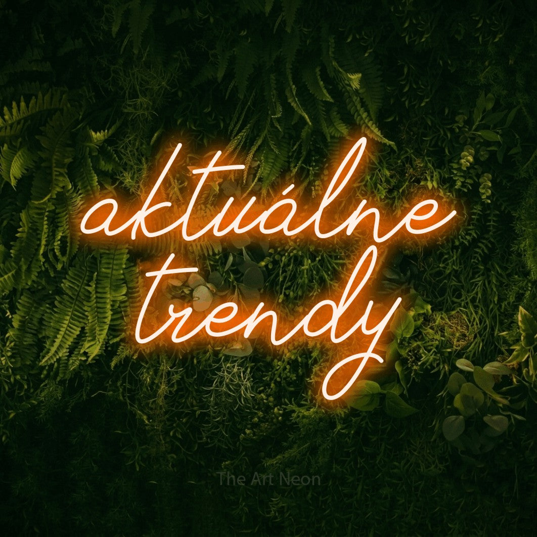 LED neon sign reading “aktuálne trendy”, arranged in two lines.