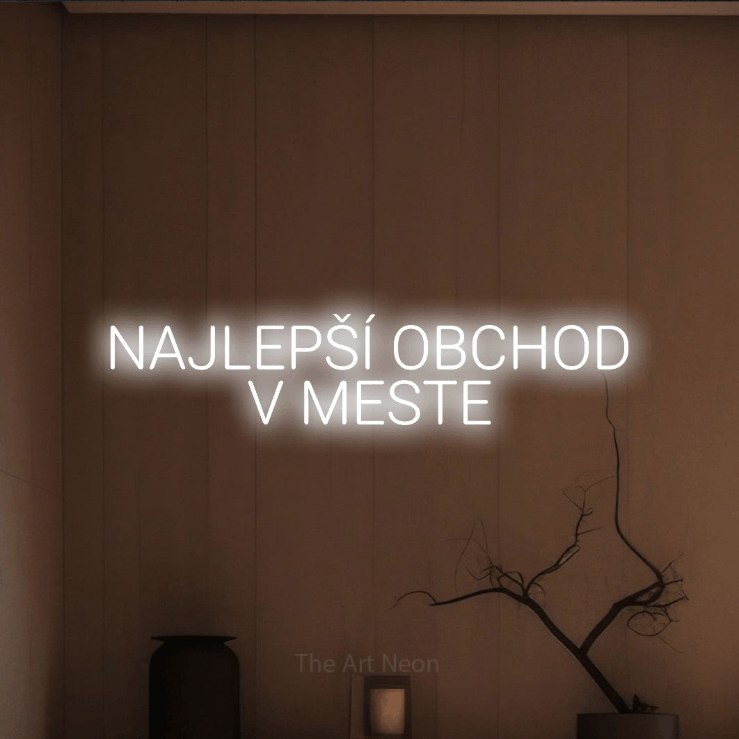 LED neon sign reading “NAJLEPŠÍ OBCHOD V MESTE”, arranged in two lines.