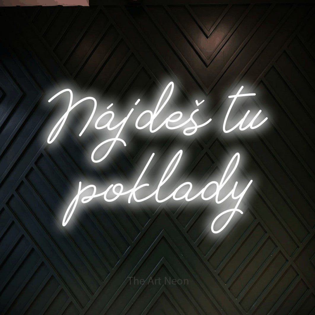 LED neon sign reading “Nájdeš tu poklady”, arranged in two lines.
