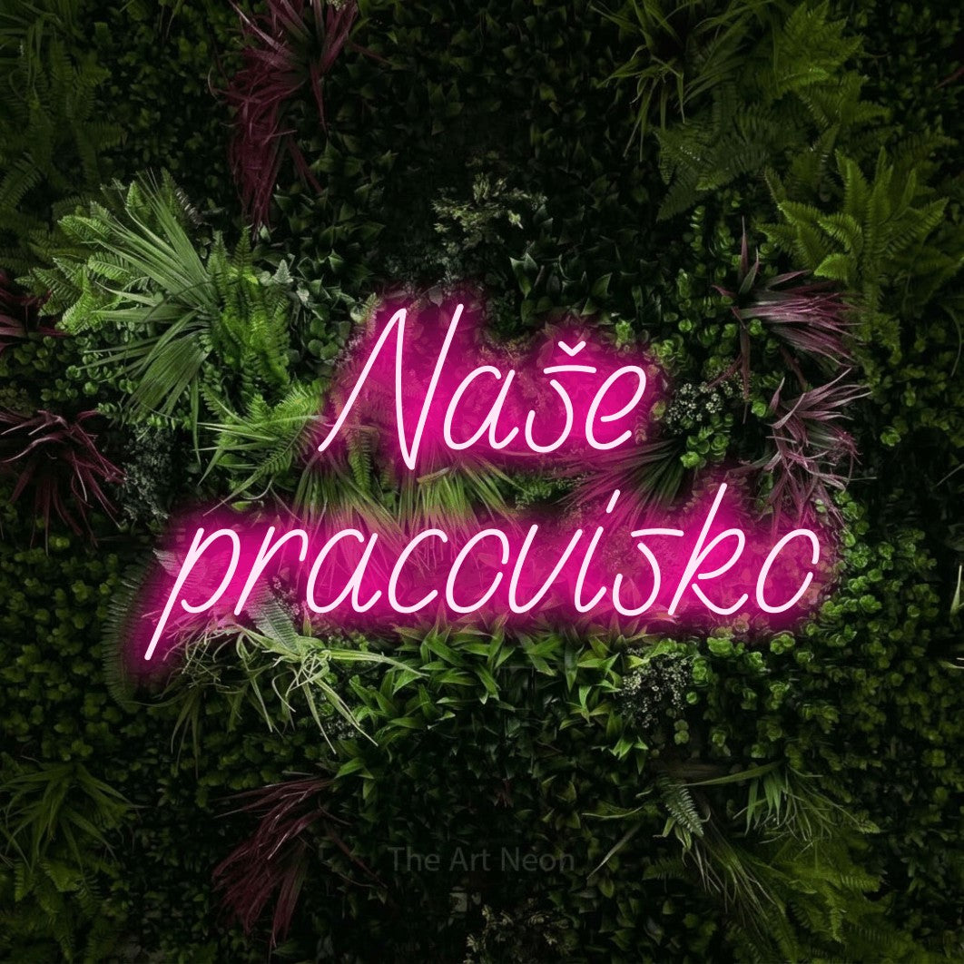 LED neon sign reading “Naše pracovisko”, arranged in two lines.