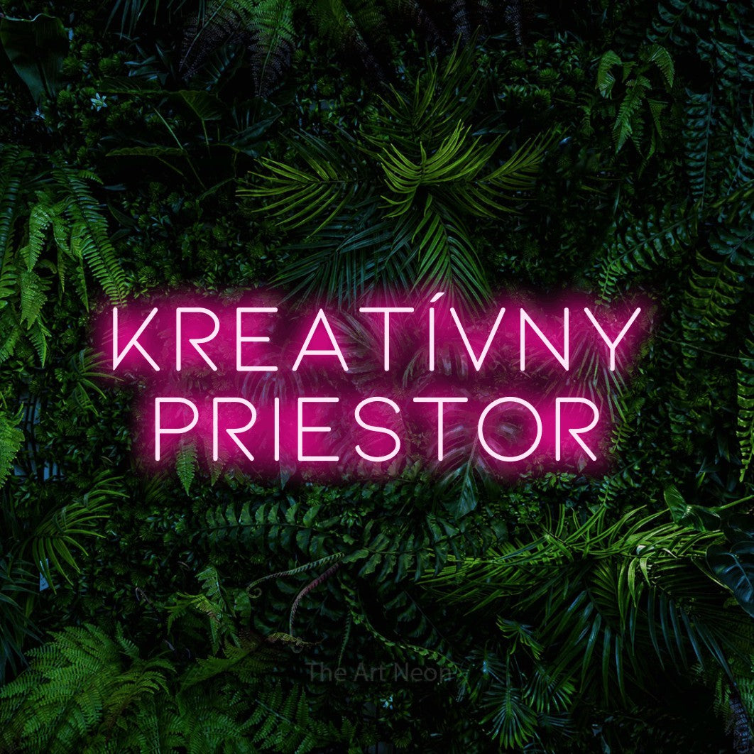LED neon sign reading “KREATÍVNY PRIESTOR”, arranged in two lines.
