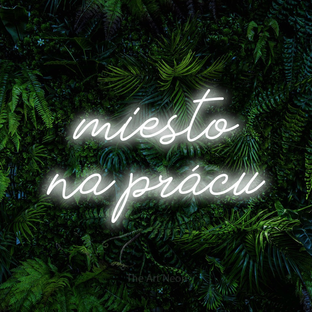 LED neon sign reading “miesto na prácu”, arranged in two lines.