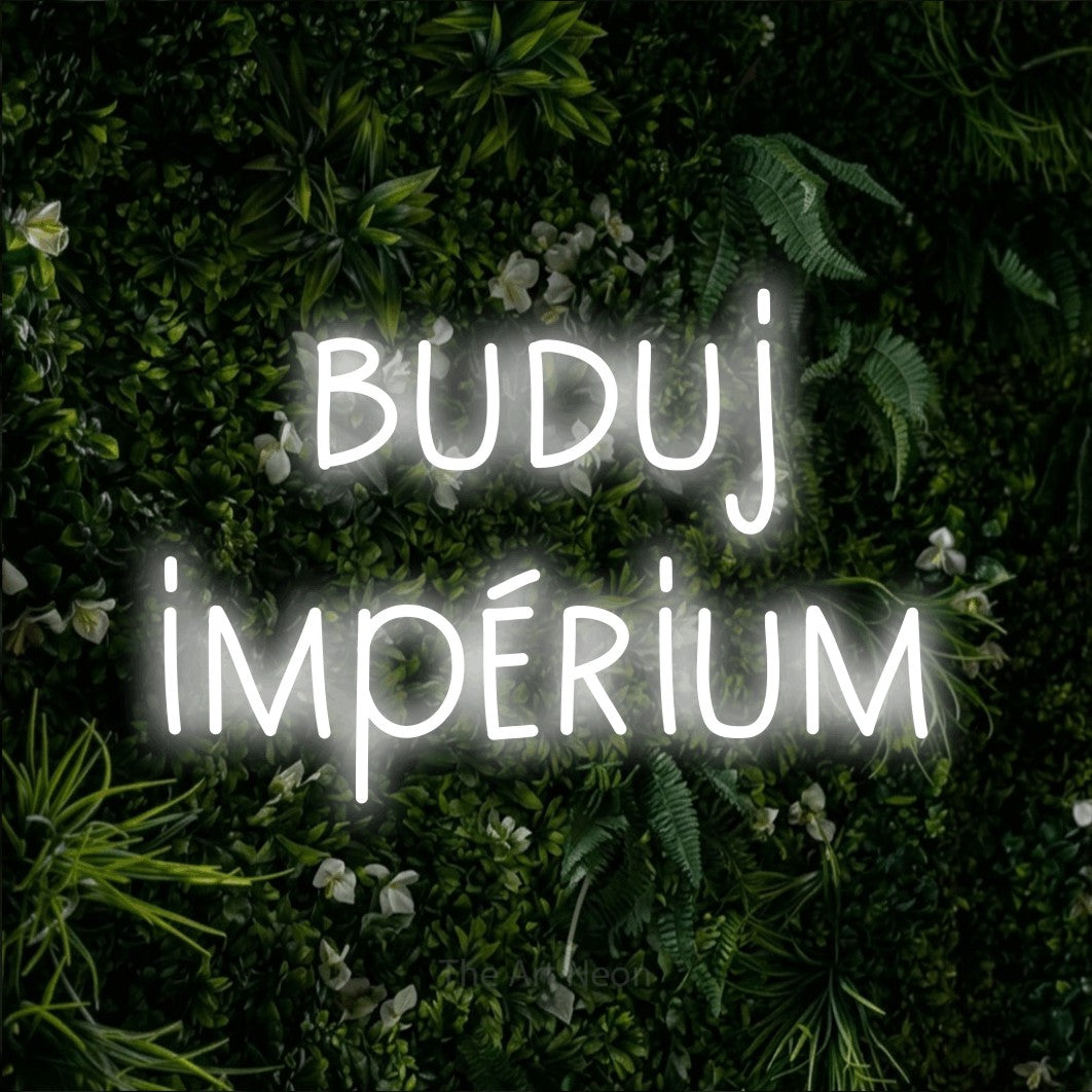 LED neon sign reading “buduj impérium”, arranged in two lines.