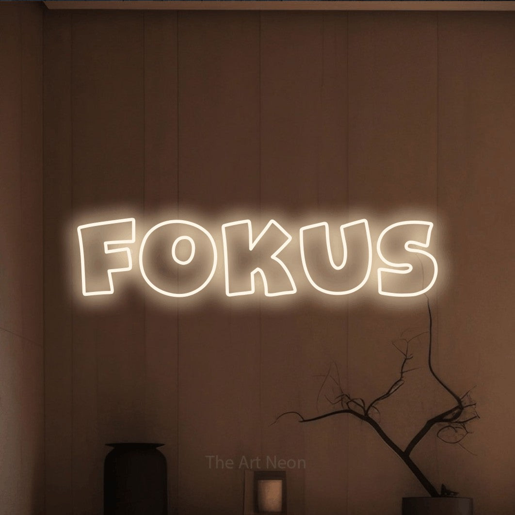 LED neon sign reading “Fokus”, arranged in a single line.