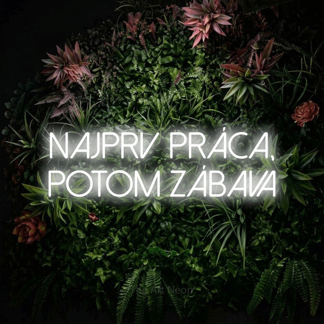 LED neon sign reading “najprv práca, potom zábava”, arranged in two lines.