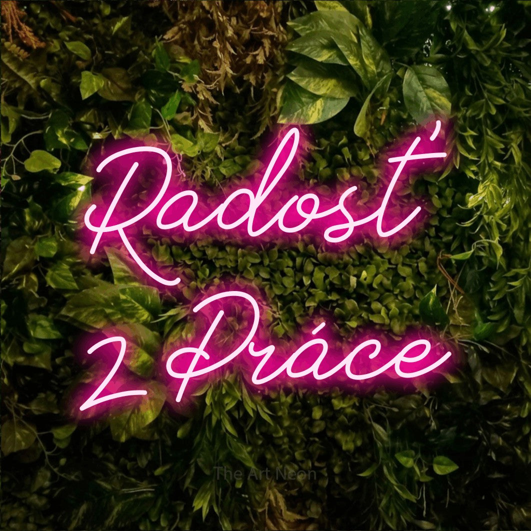 LED neon sign reading “Radosť z Práce”, arranged in two lines.