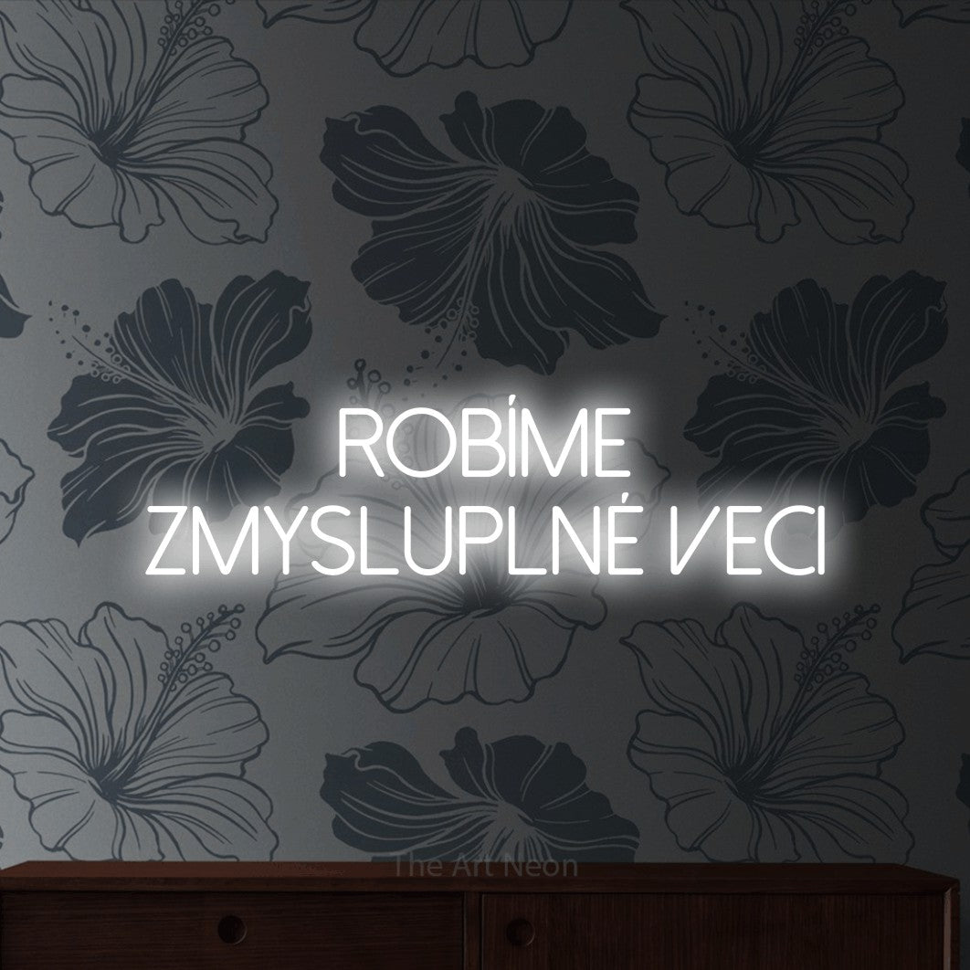LED neon sign reading “Robíme zmysluplné veci”, arranged in two lines.