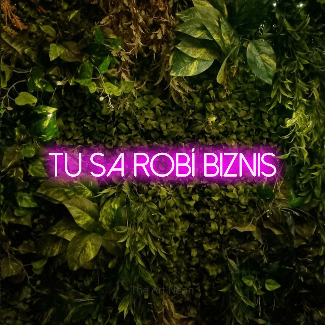 LED neon sign reading “tu sa robí biznis”, arranged in a single line.