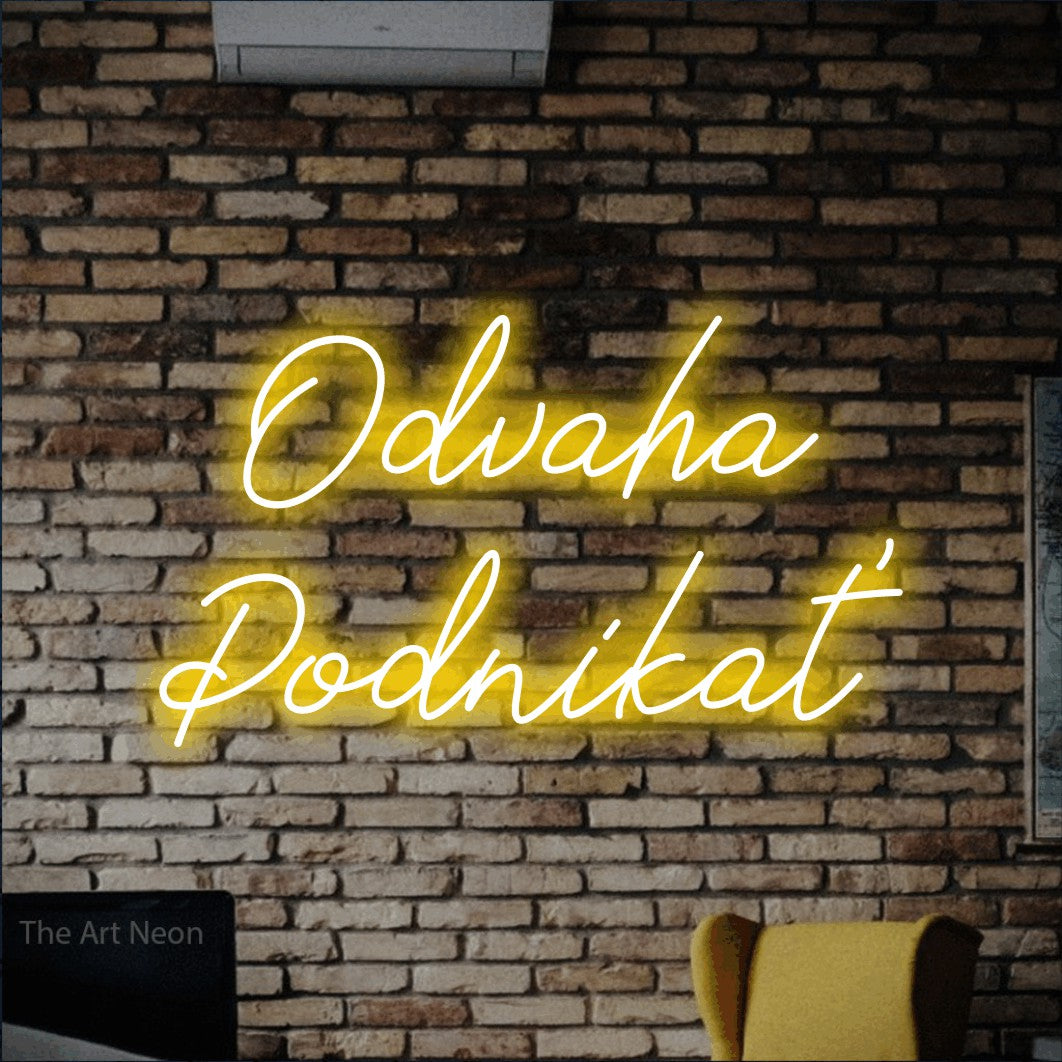LED neon sign reading “Odvaha Podnikať”, arranged in two lines.