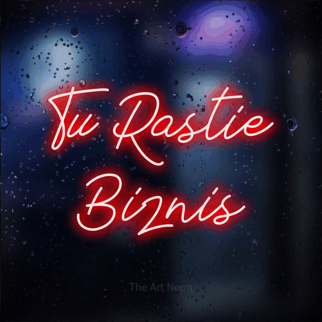 LED neon sign reading “Tu Rastie Biznis”, arranged in two lines.