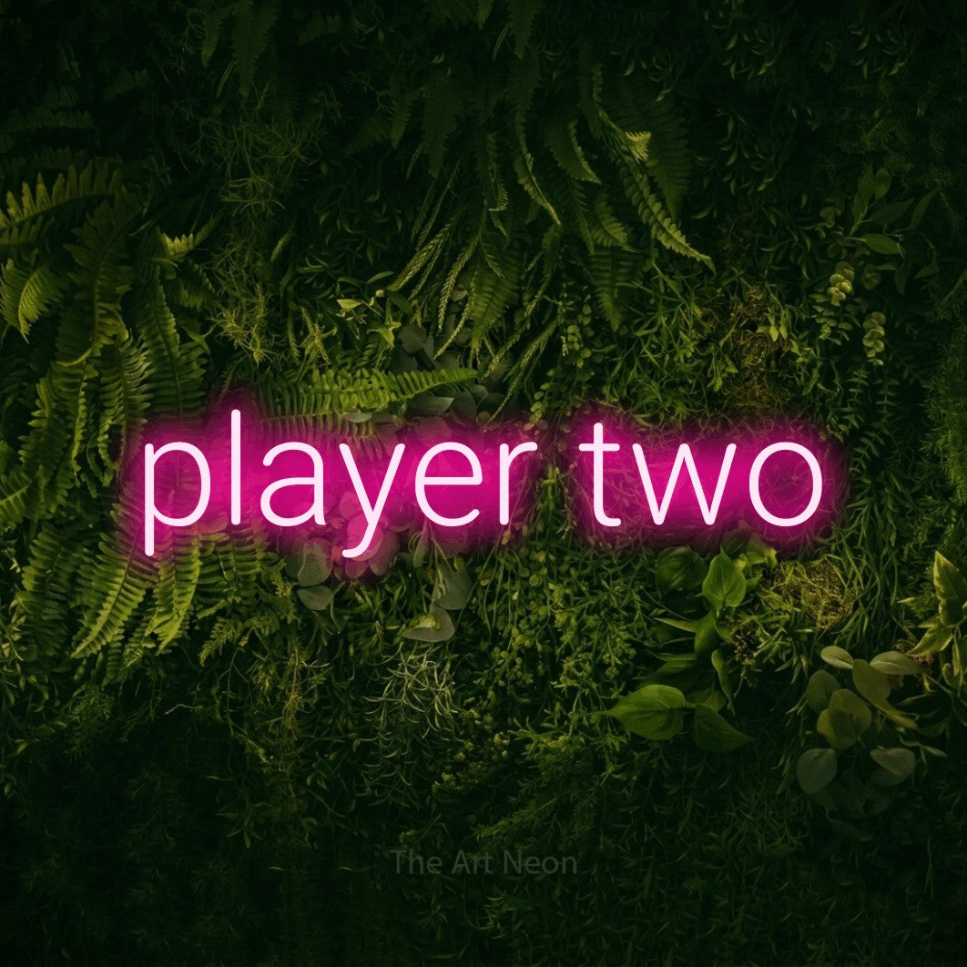 LED neon sign reading “player two”, arranged in a single line.