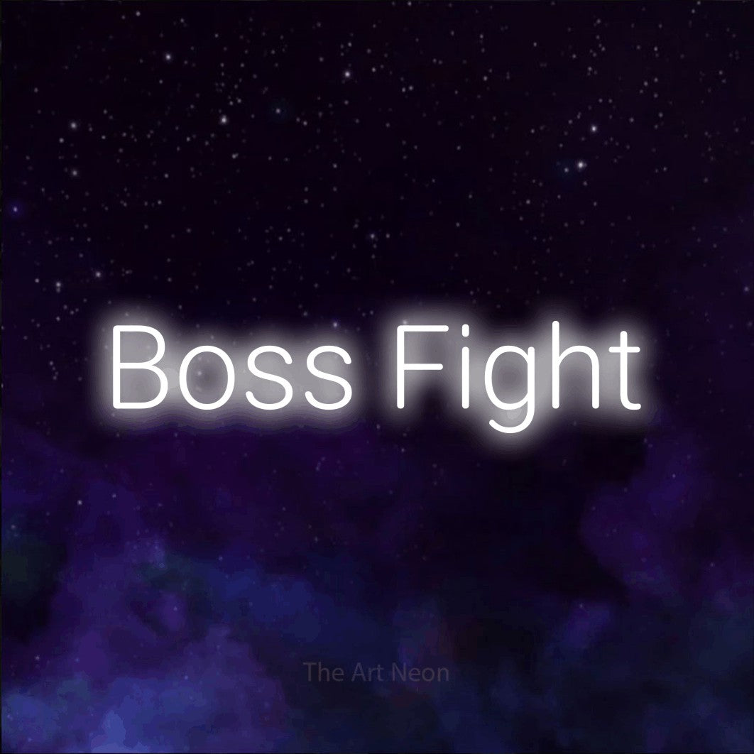 LED neon sign reading “Boss Fight”, arranged in a single line.