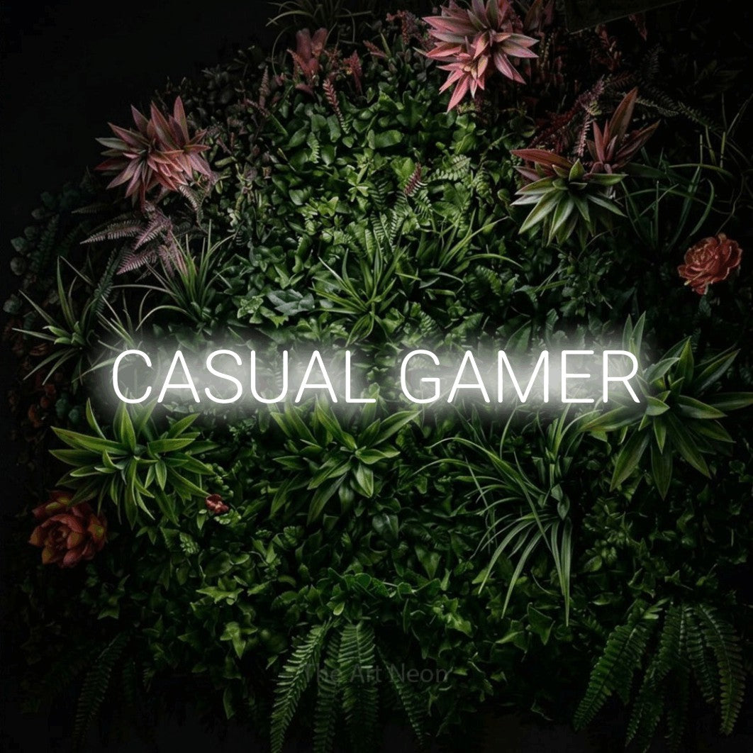 LED neon sign reading “CASUAL GAMER”, arranged in a single line.