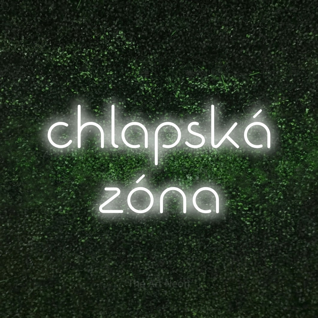 LED neon sign reading “chlapská zóna”, arranged in two lines.