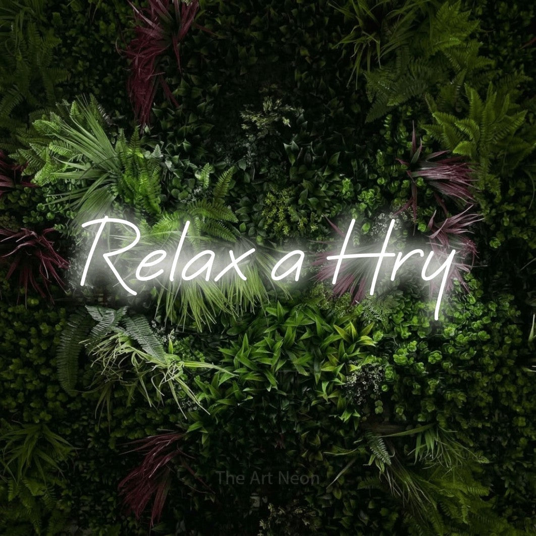 LED neon sign reading “Relax a Hry”, arranged in a single line.