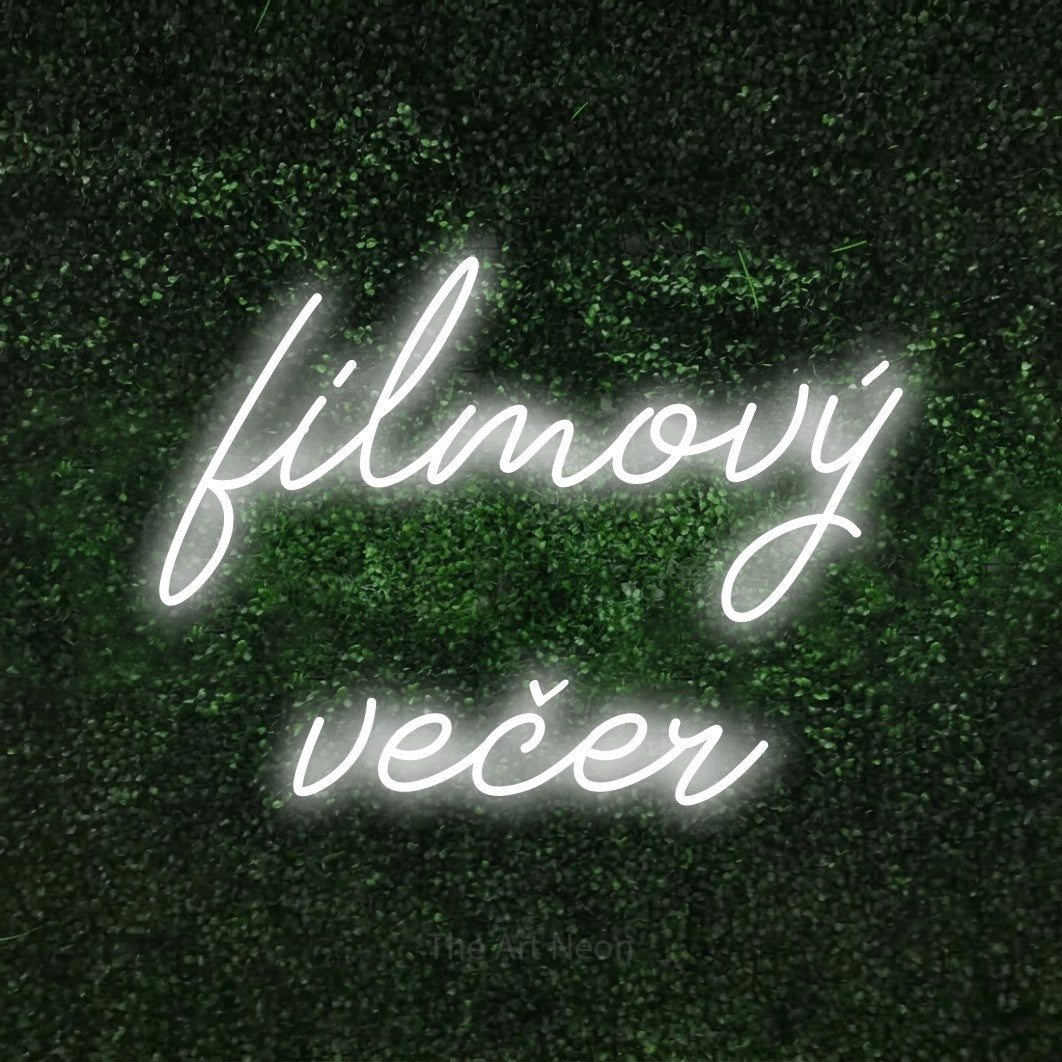 LED neon sign reading “filmový večer”, arranged in two lines.