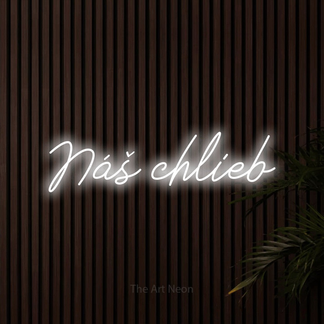 LED neon sign reading “Náš chlieb”, arranged in a single line.