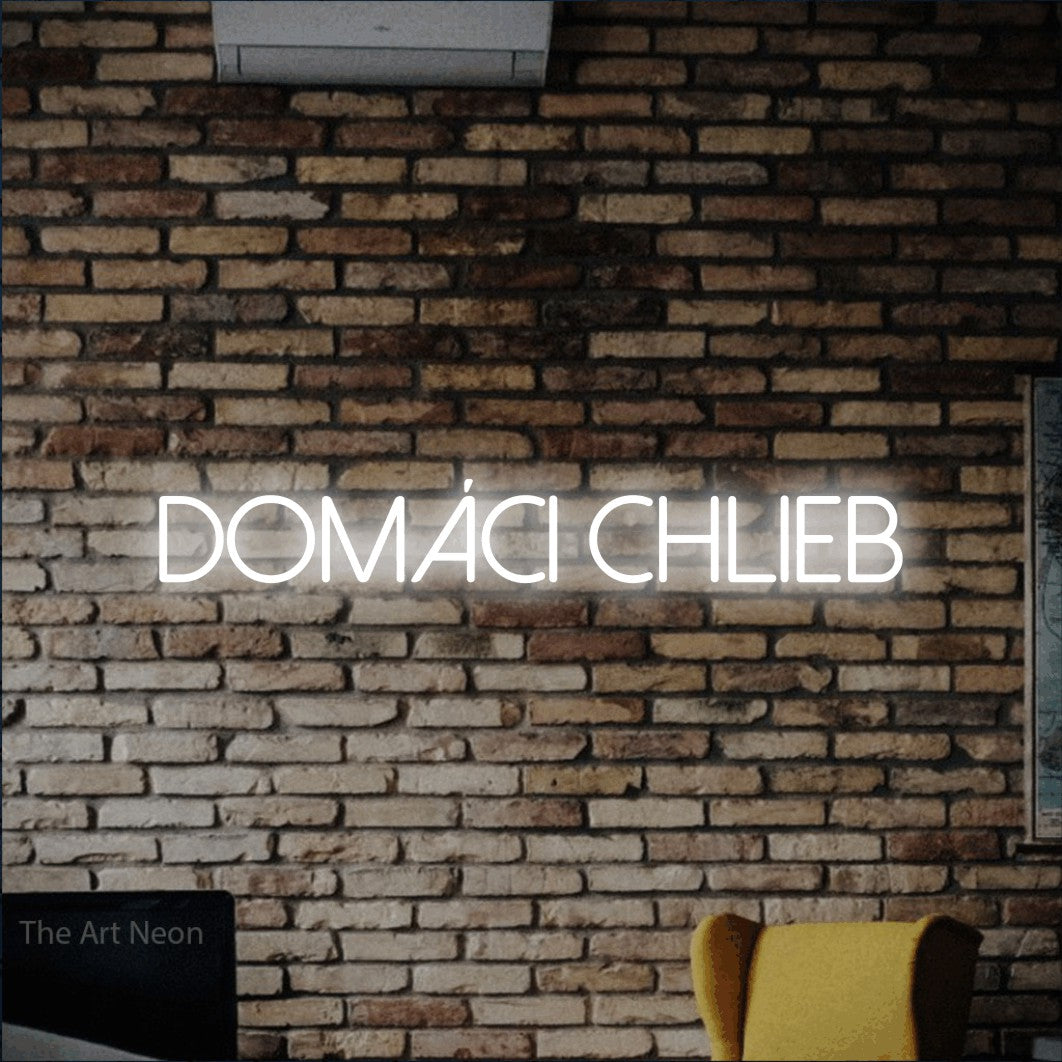 LED neon sign reading “domáci chlieb”, arranged in a single line.