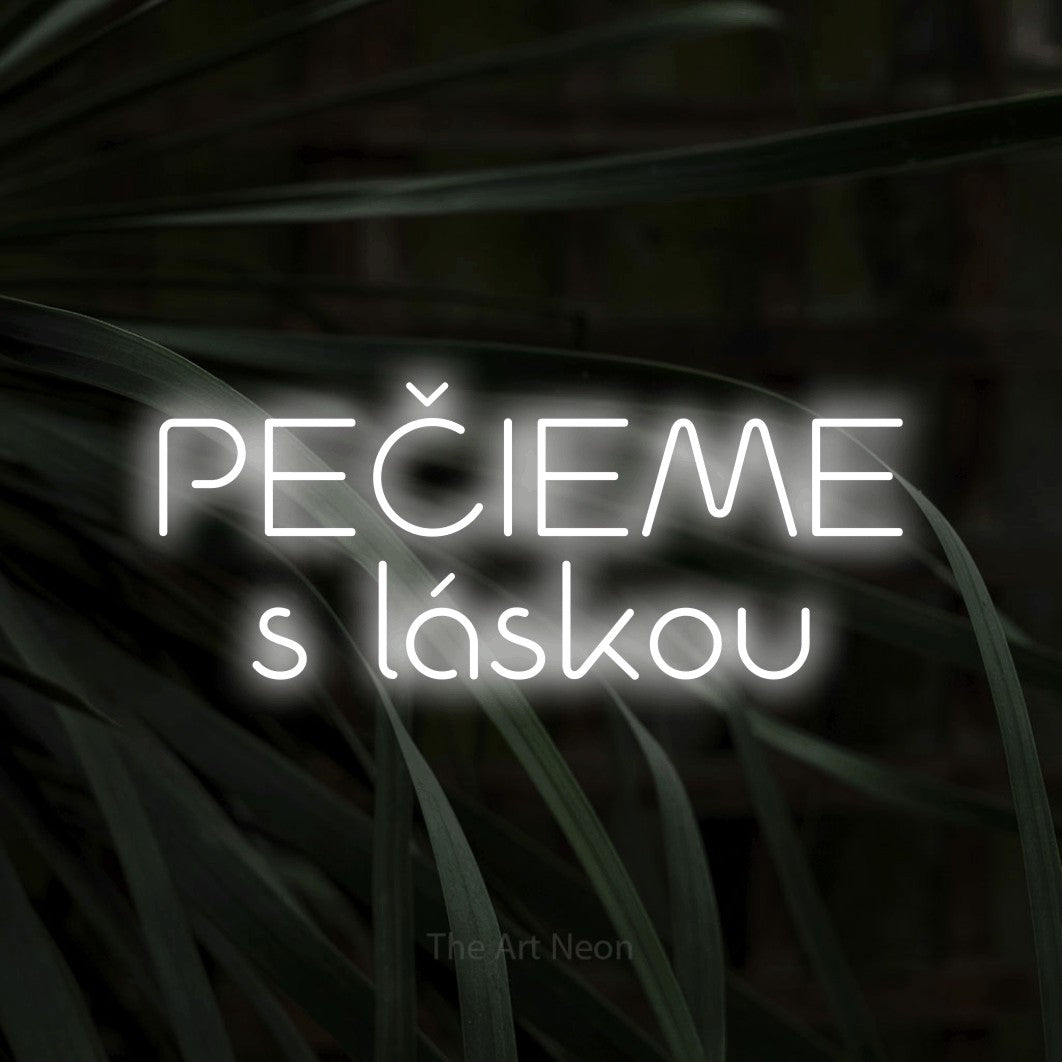 LED neon sign reading “PEČIEME s láskou”, arranged in two lines.