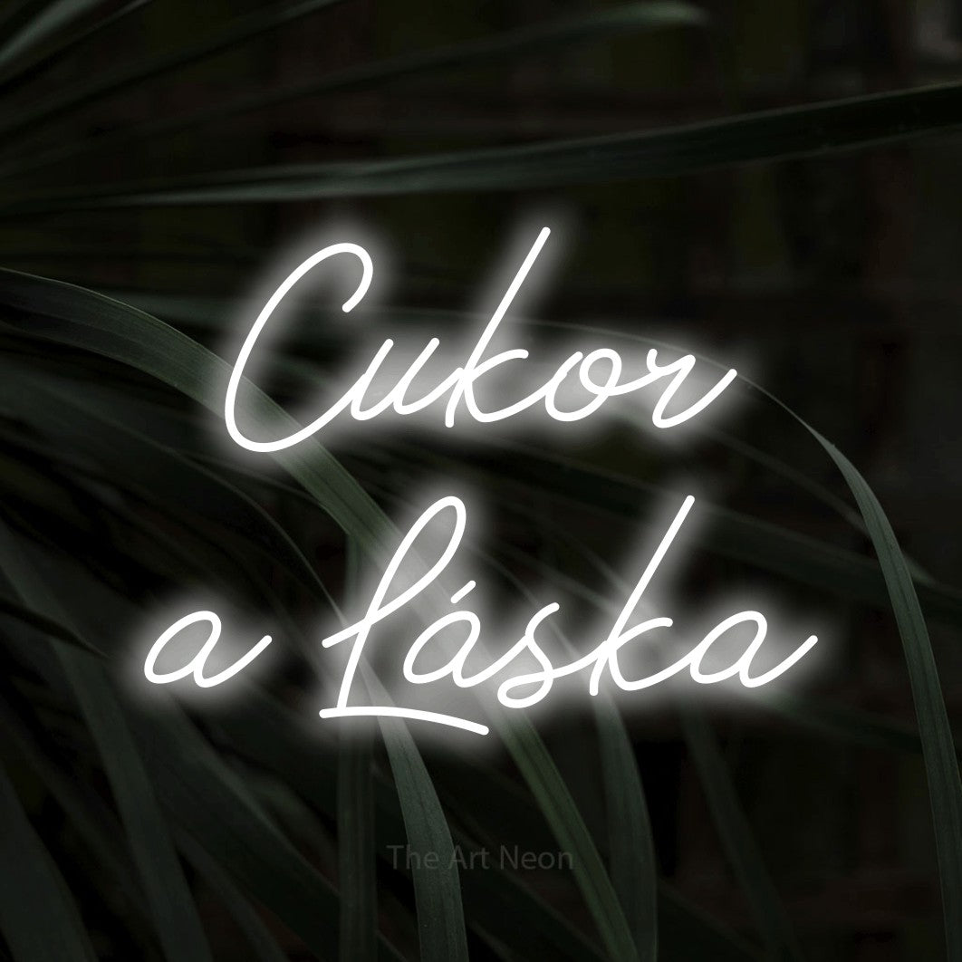 LED neon sign reading “Cukor a Láska”, arranged in two lines.